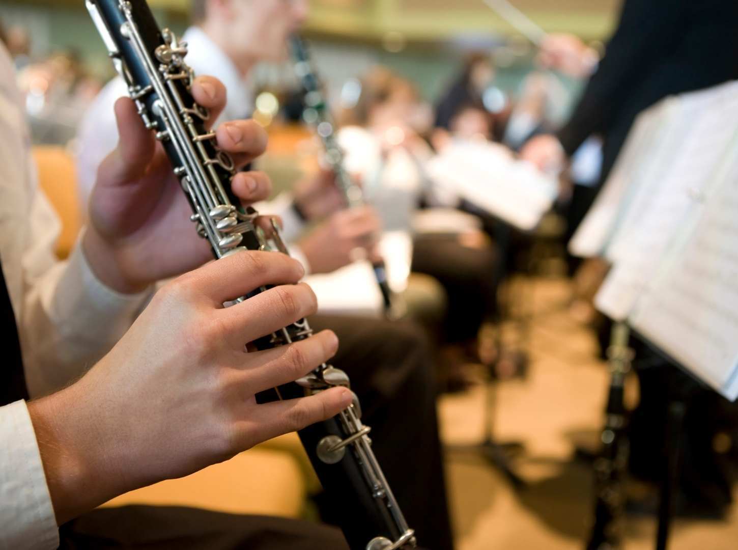 Musician playing the clarinet in an orchestra